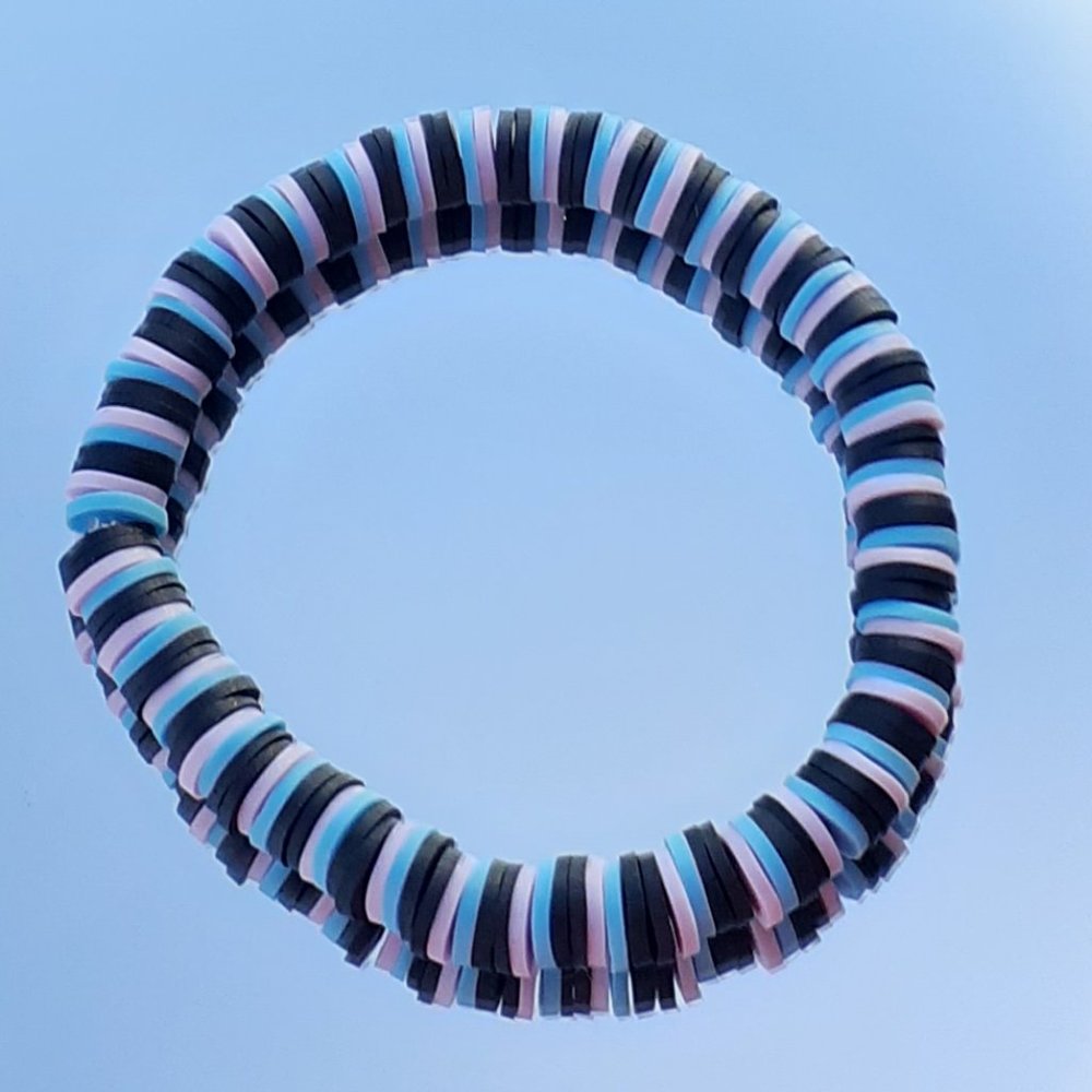 Clay bead stretchy string bracelet When you buy 2 you get 1 free bracelet!